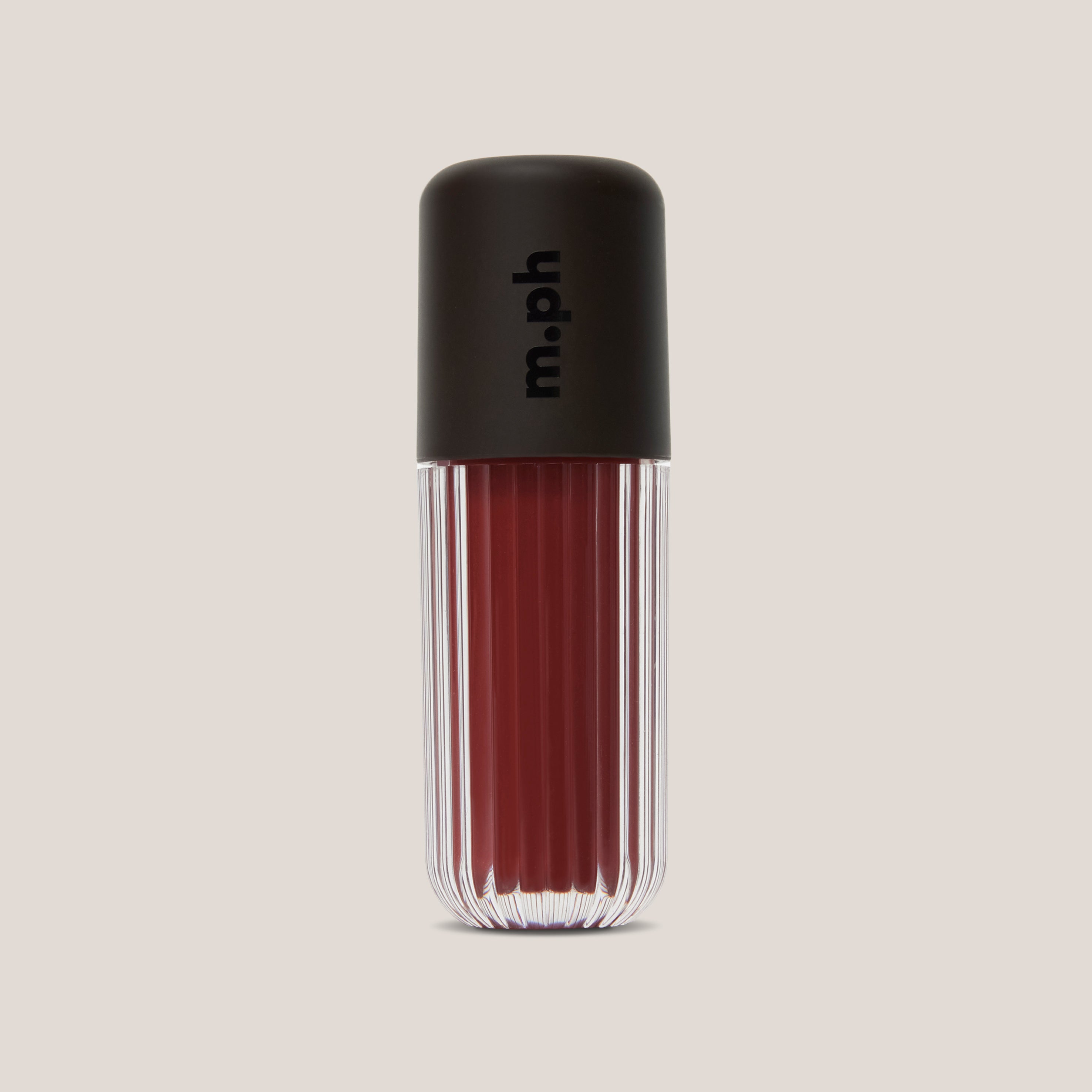 A single lip gloss bottle from the brand m.ph, featuring a ribbed clear glass body showing a deep berry red gloss and a matte black cap with the brand name printed vertically in black.