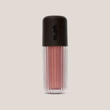 A ribbed clear cosmetic tube containing a shimmering dusty rose pink liquid, topped with a matte black cap featuring the vertical 'm.ph' logo, set against a solid light beige background.