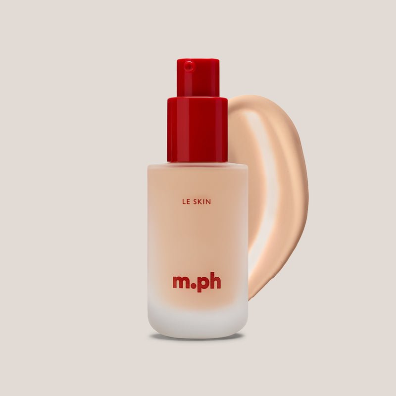 m.ph Le Skin foundation bottle with red pump cap and light porcelain swatch