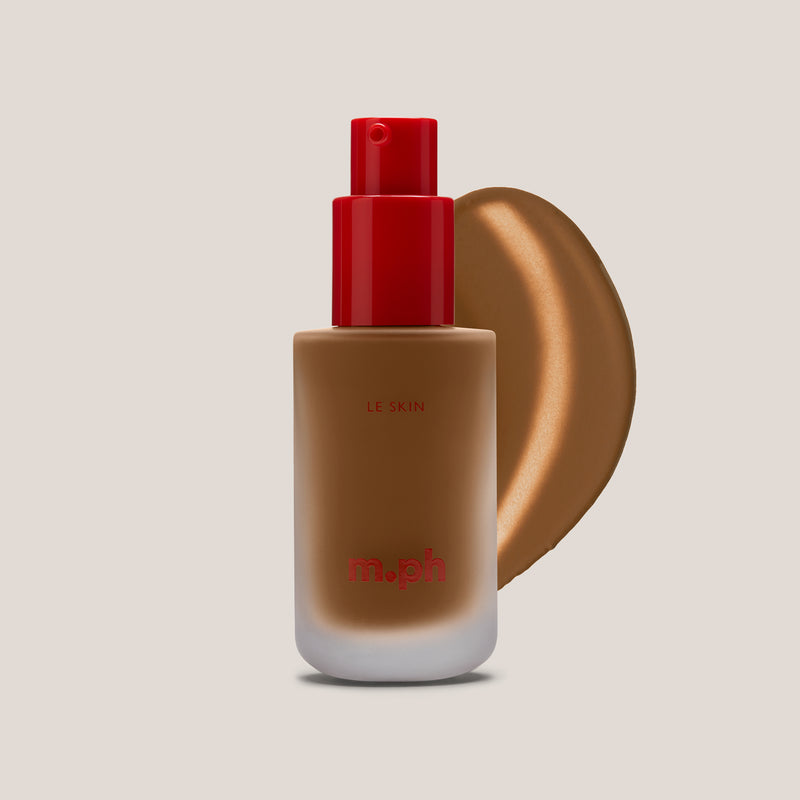 m.ph Le Skin foundation bottle with red pump cap and rich espresso swatch