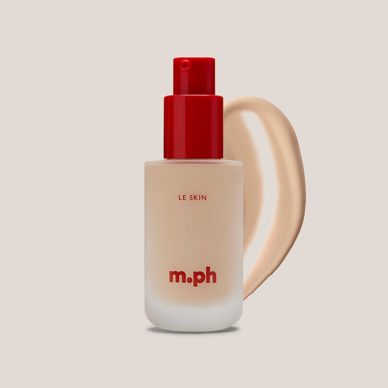 m.ph Le Skin long lasting makeup foundation bottle with red pump cap and fair vanilla swatch