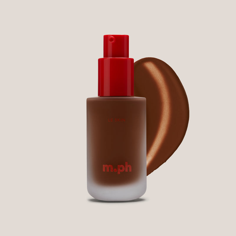 m.ph Le Skin foundation bottle with red pump cap and rich chocolate swatch