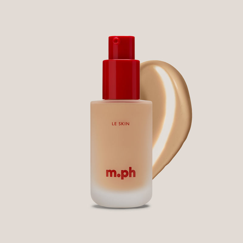 m.ph Le Skin fair skin foundation bottle with red pump cap and warm bisque swatch