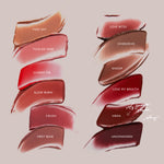 Collection of lipstick swatches in various shades with names on a light pink background