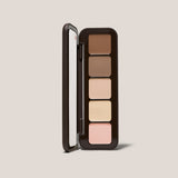 Open Underpainting face palette in Fair with five cream contour, highlight, and blush shades.