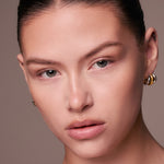 Sculpted contour and highlight finish on fair skin using the Underpainting face palette.