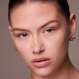 Sculpted contour and highlight finish on fair skin using the Underpainting face palette.
