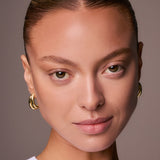 Sculpted contour and highlight on light skin using the Underpainting face palette technique.